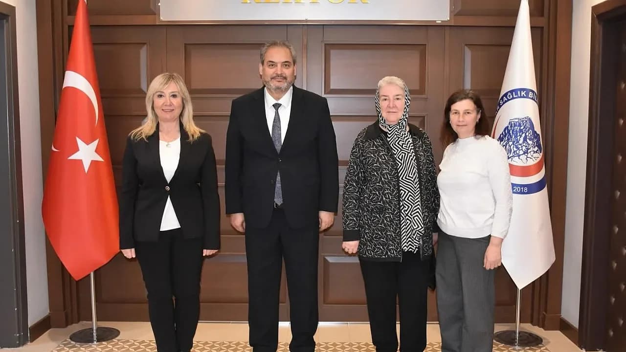 MHP KAÇEP Heyeti, AFSÜ Rektörü Aslan'ı Ziyaret Etti